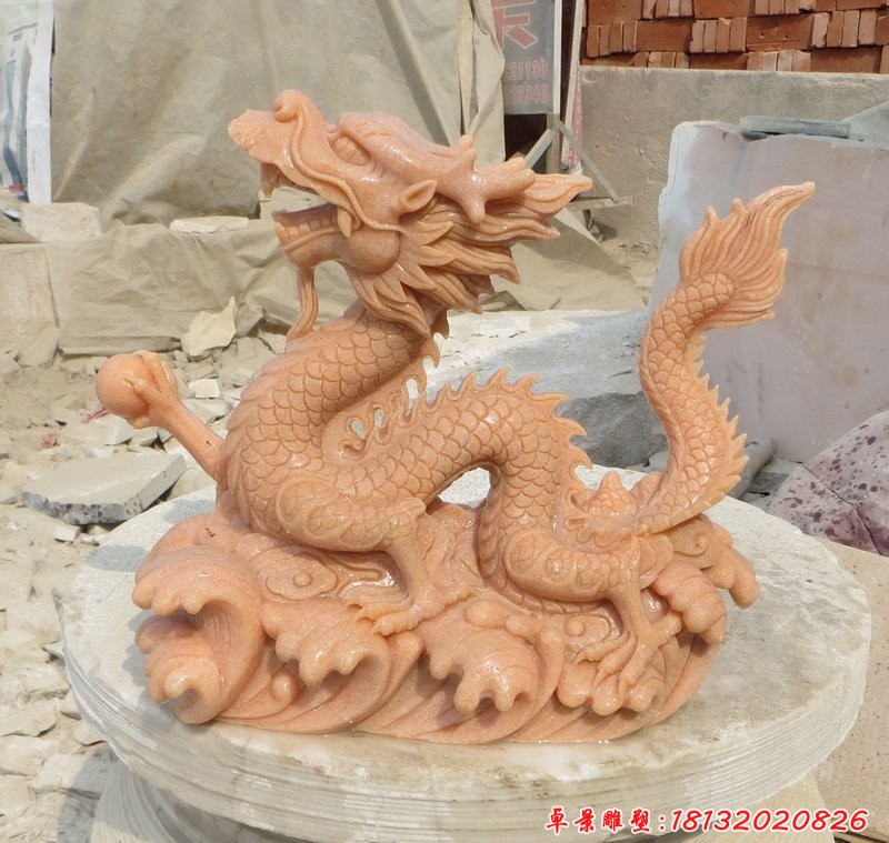 龙戏珠石雕，晚霞红石雕龙