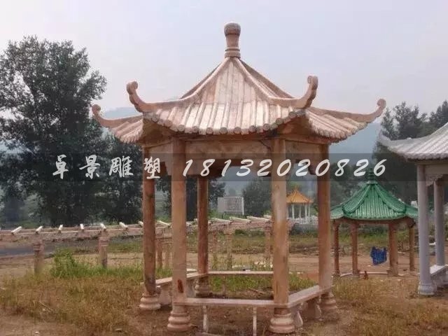 公园凉亭石雕晚霞红石头凉亭